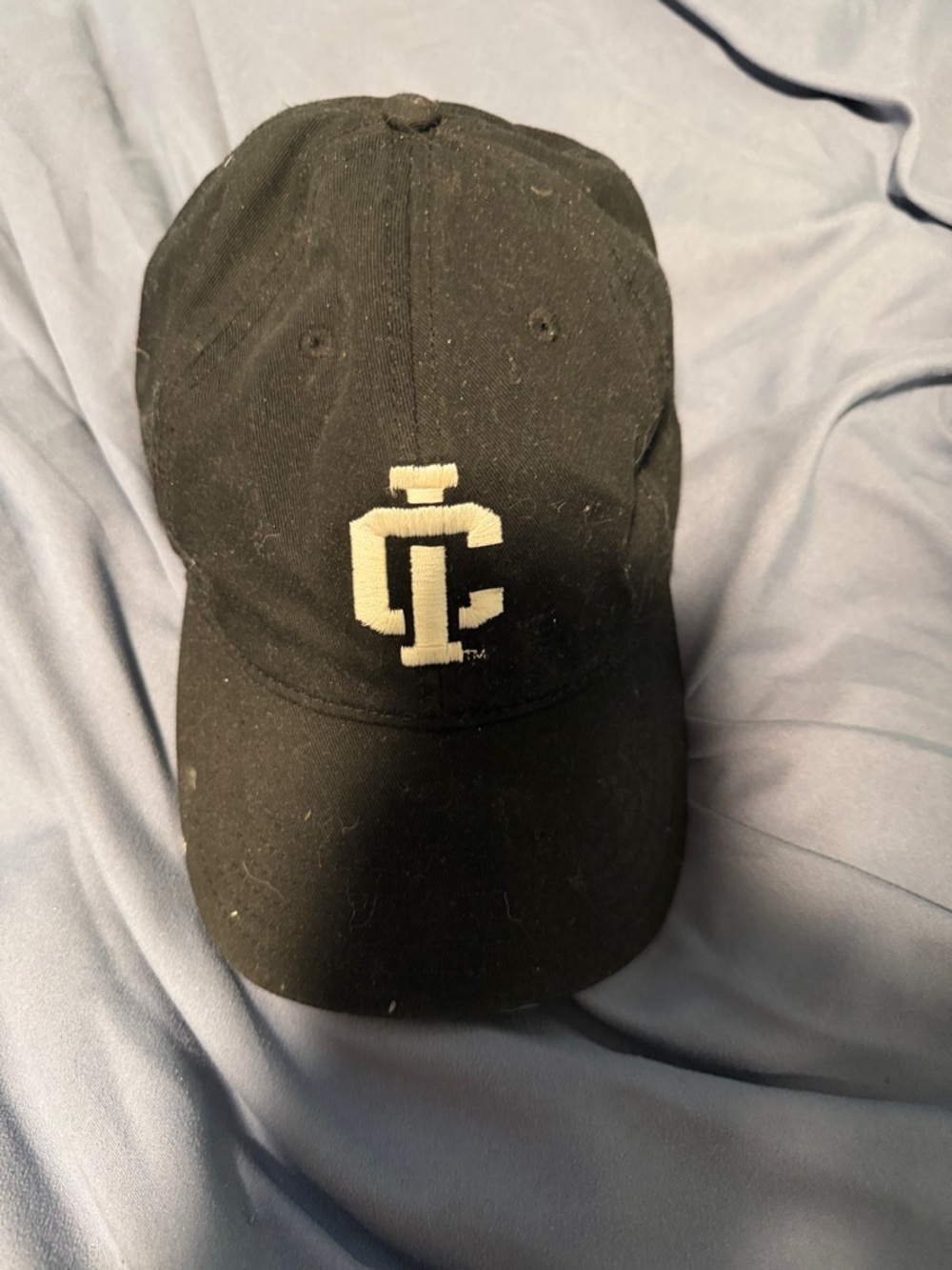 Black Baseball Cap with White Embroidered Monogram Ithaca college